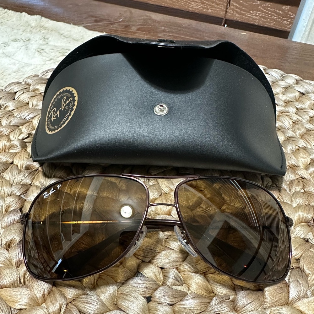 Rayban aviators - polarized - brownish lenses with bronze frame.